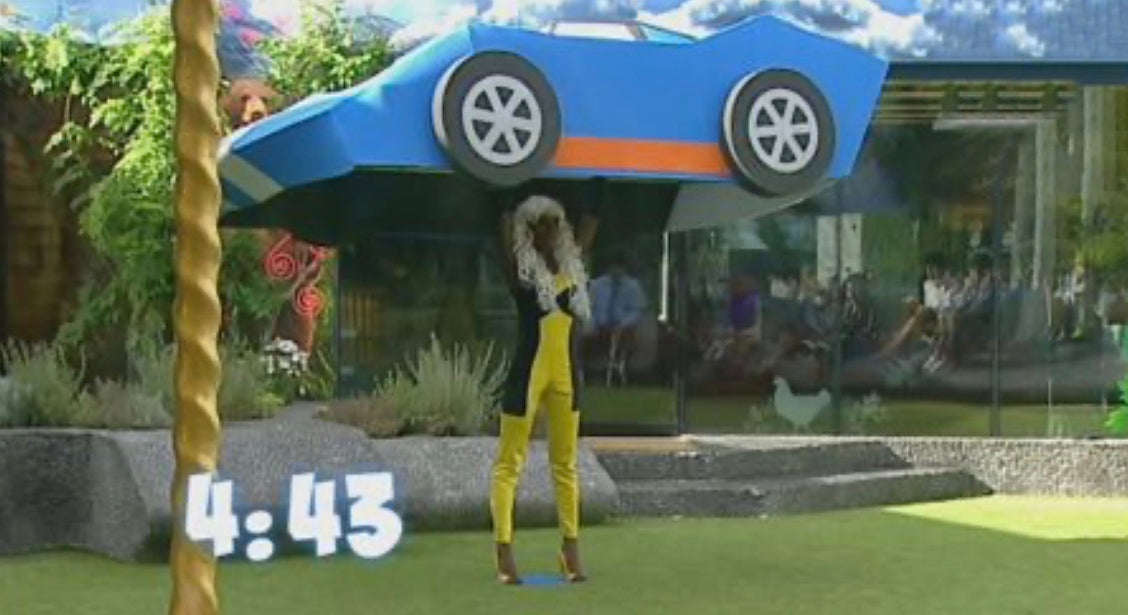 Holding a Car and Life’s Gusty Moments 🚗💨